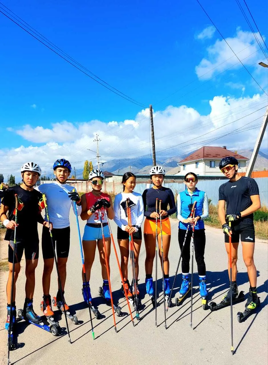 Kyrgyz biathletes with roller skis at the Cholpon-Ata training camp